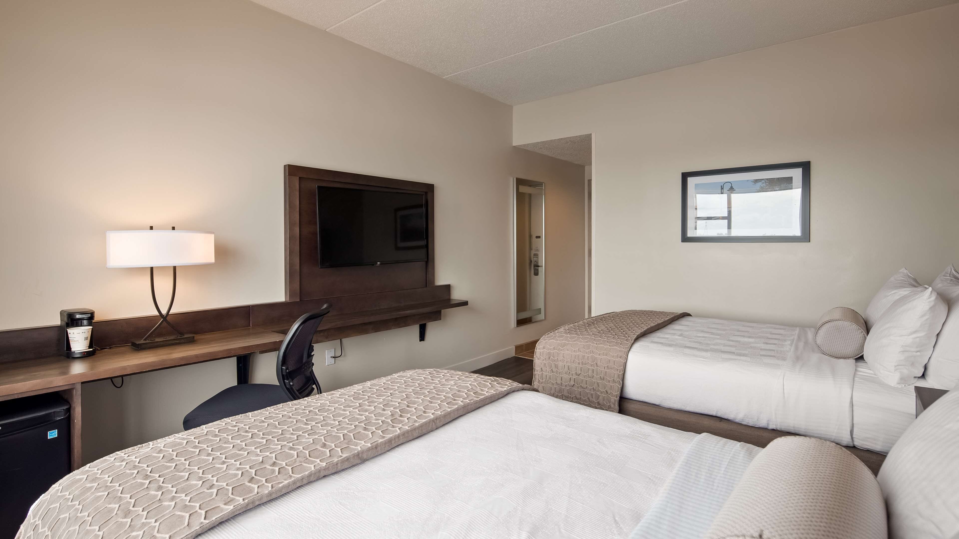 standard room, 2 double beds, non smoking, river view | desk, laptop workspace, blackout curtains, iron/ironing board