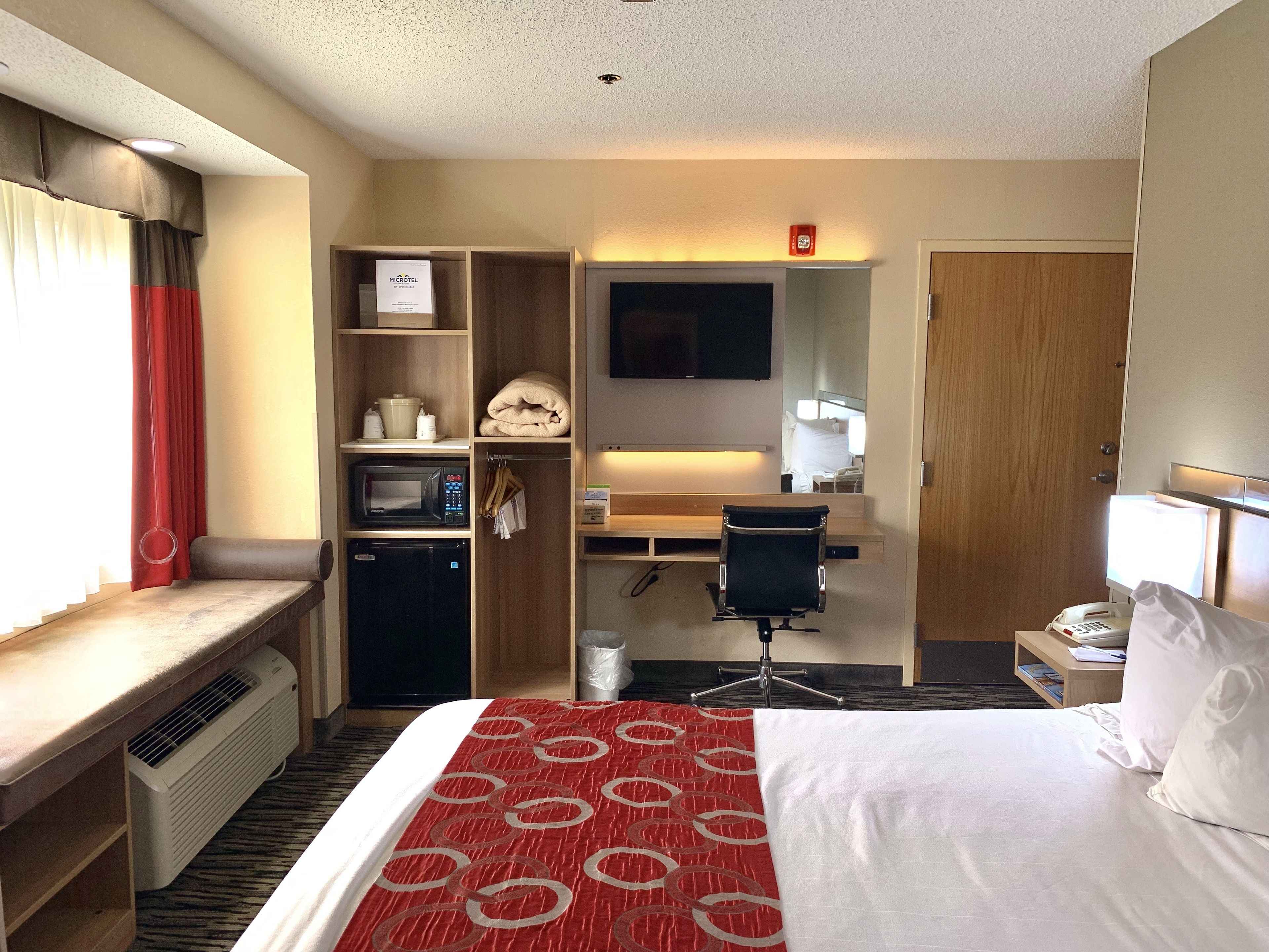 room, 1 king bed, non smoking | desk, blackout curtains, iron/ironing board, free wifi