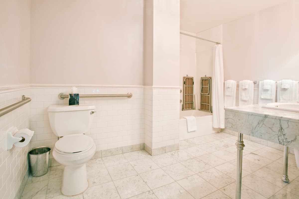 premium room, 2 queen beds, accessible | bathroom | designer toiletries, hair dryer, bathrobes, towels