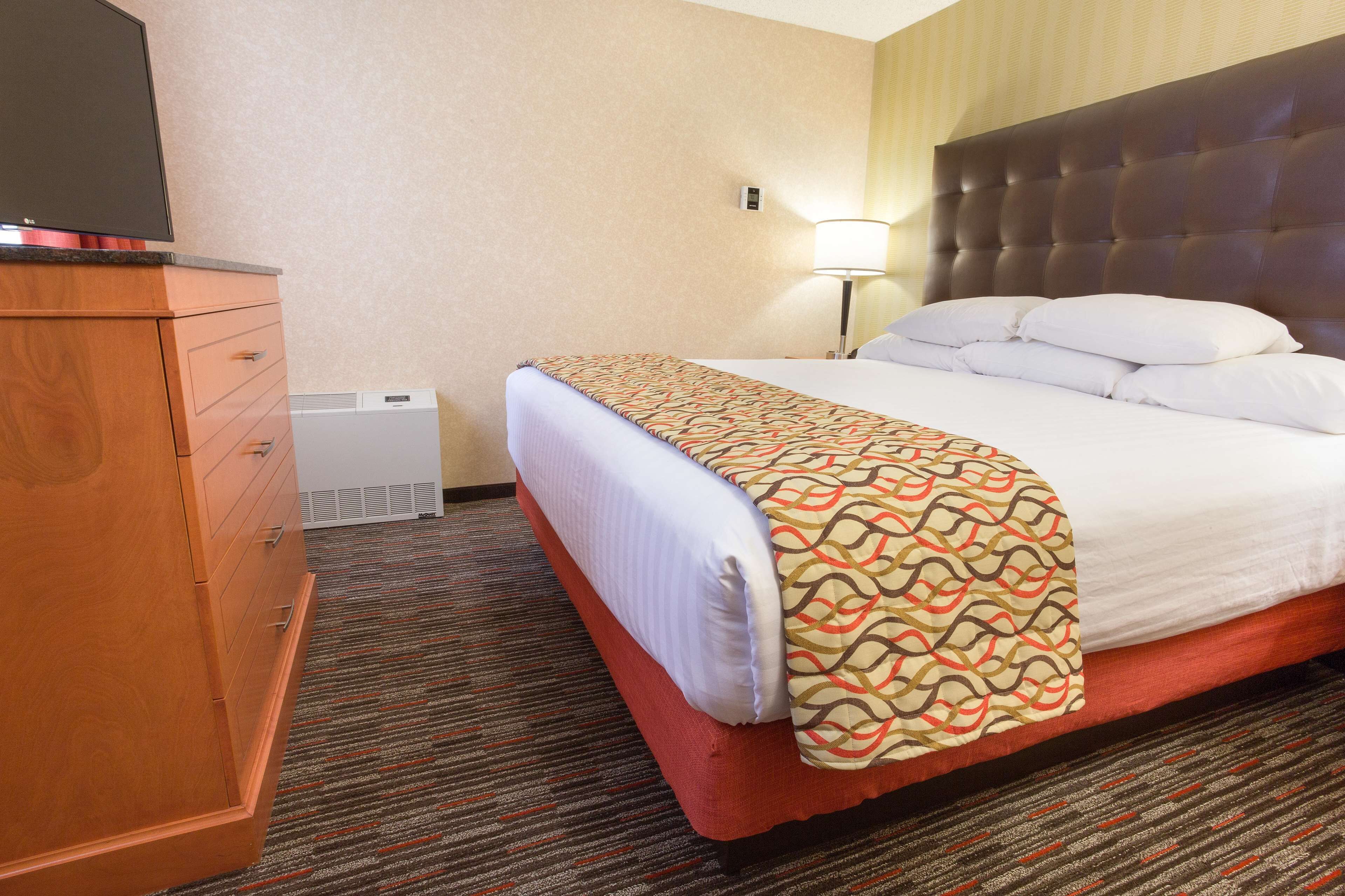 suite, 1 king bed with sofa bed, refrigerator & microwave (2 rooms) | 1 bedroom, desk, blackout curtains, iron/ironing board