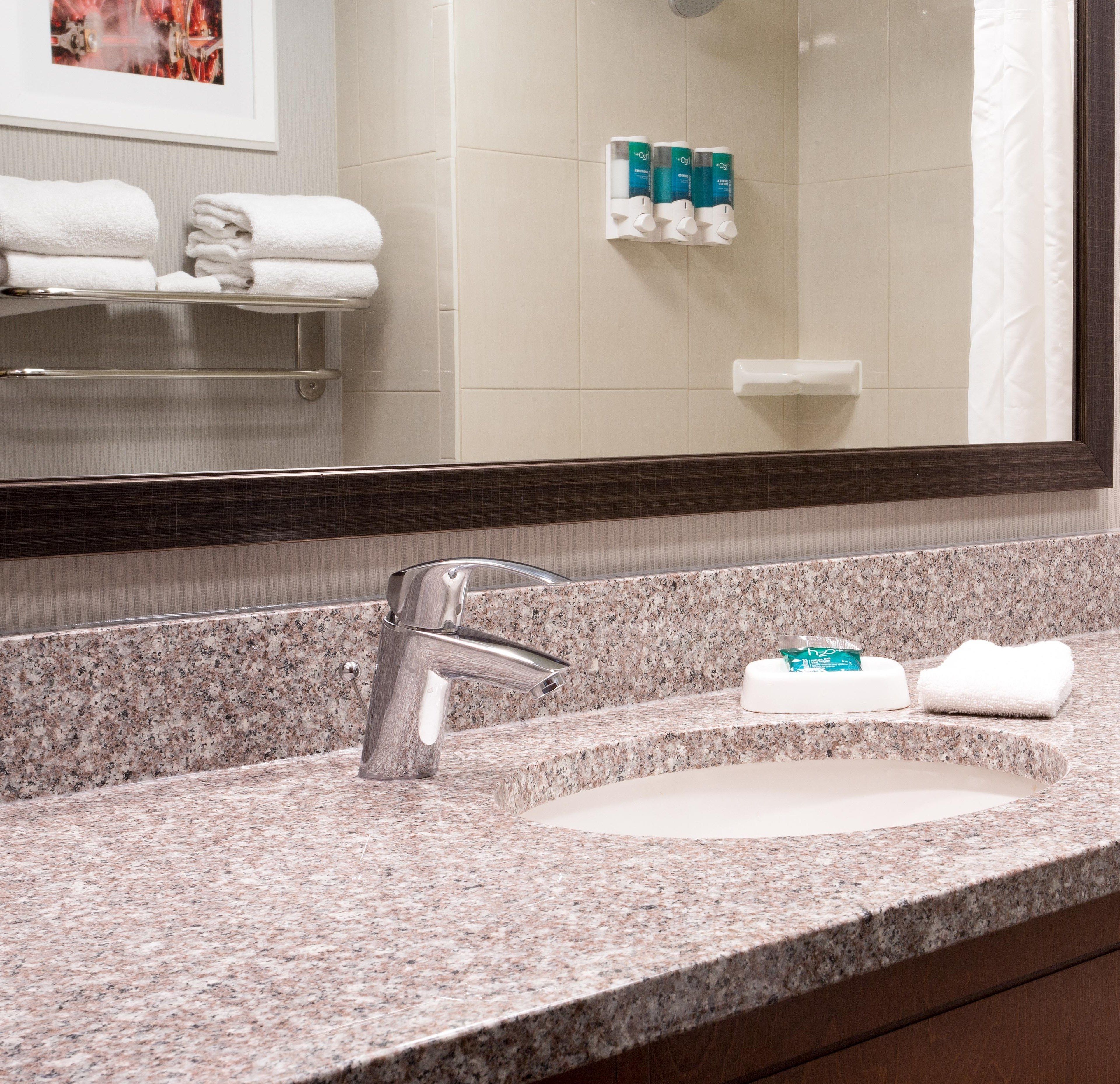 combined shower/bathtub, free toiletries, hair dryer, towels