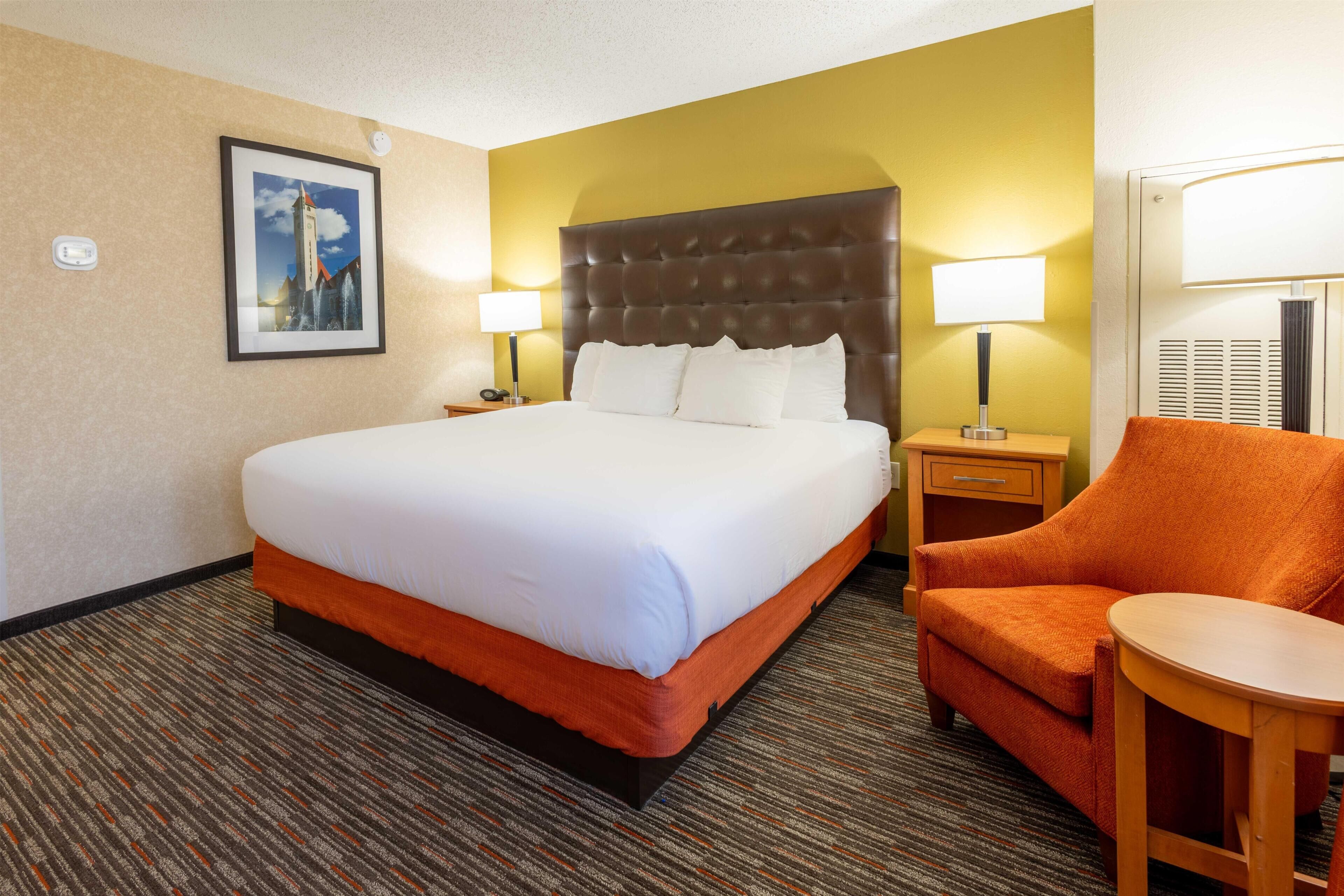 Desk, blackout drapes, iron/ironing board, free cribs/infant beds