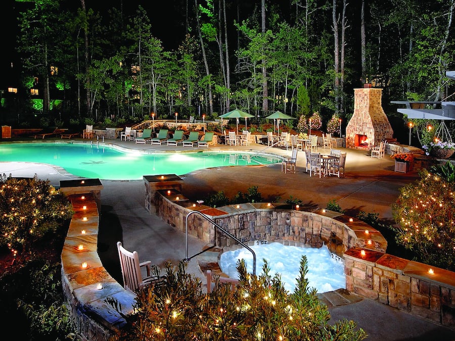 Seasonal outdoor pool, open 8:00 AM to 8:00 PM, pool umbrellas