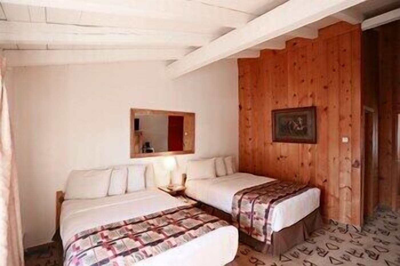 Premium bedding, pillow-top beds, desk, blackout curtains