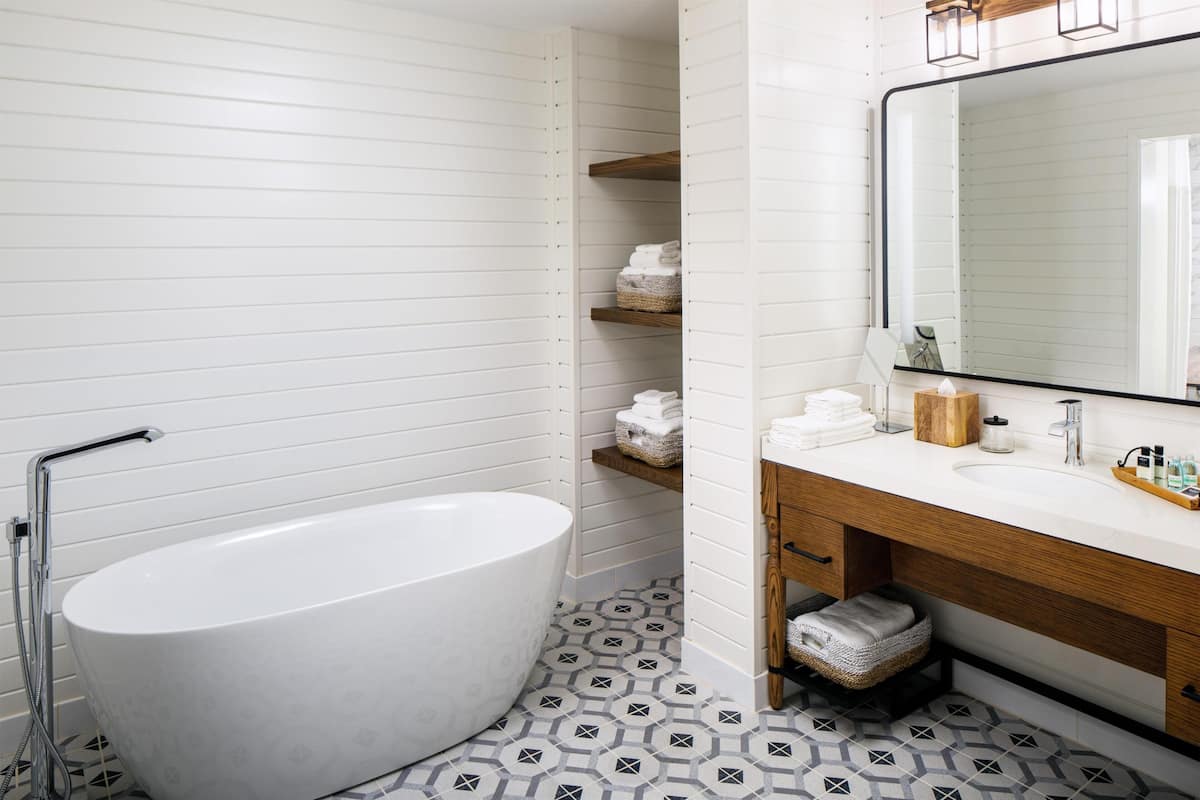 Premium Suite, 1 Bedroom (Sweetgrass Inn) | In-room safe, desk, laptop workspace, iron/ironing board