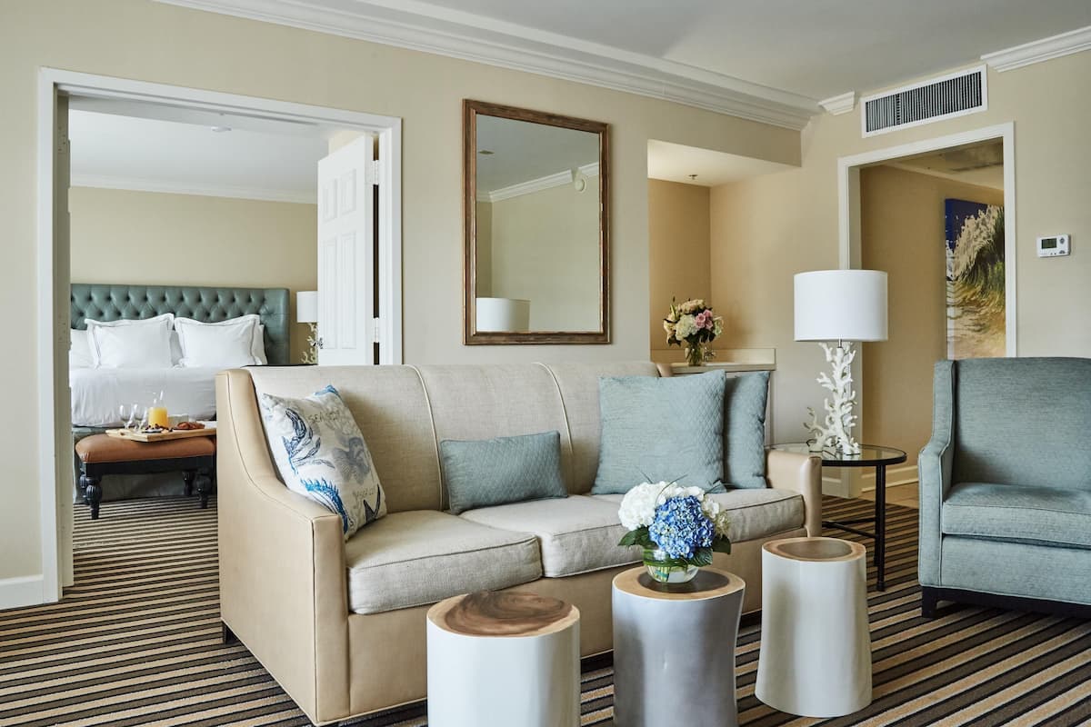 Junior Suite (Boardwalk Inn) | In-room safe, desk, laptop workspace, iron/ironing board