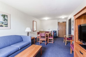 Suite, 1 très grand lit, non-fumeur (One-Bedroom Suite) | Coffre-fort, bureau, rideaux d’obscurcissement