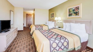 A hotel room with two beds, a TV, a desk, and a painting on the wall. - Super 8 by Wyndham Port Clinton (Port Clinton)