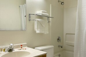 Combined shower/tub, hair dryer, towels, soap