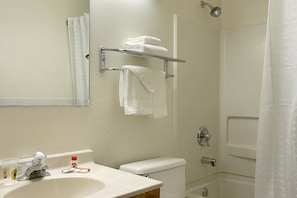 Combined shower/bathtub, hair dryer, towels, soap