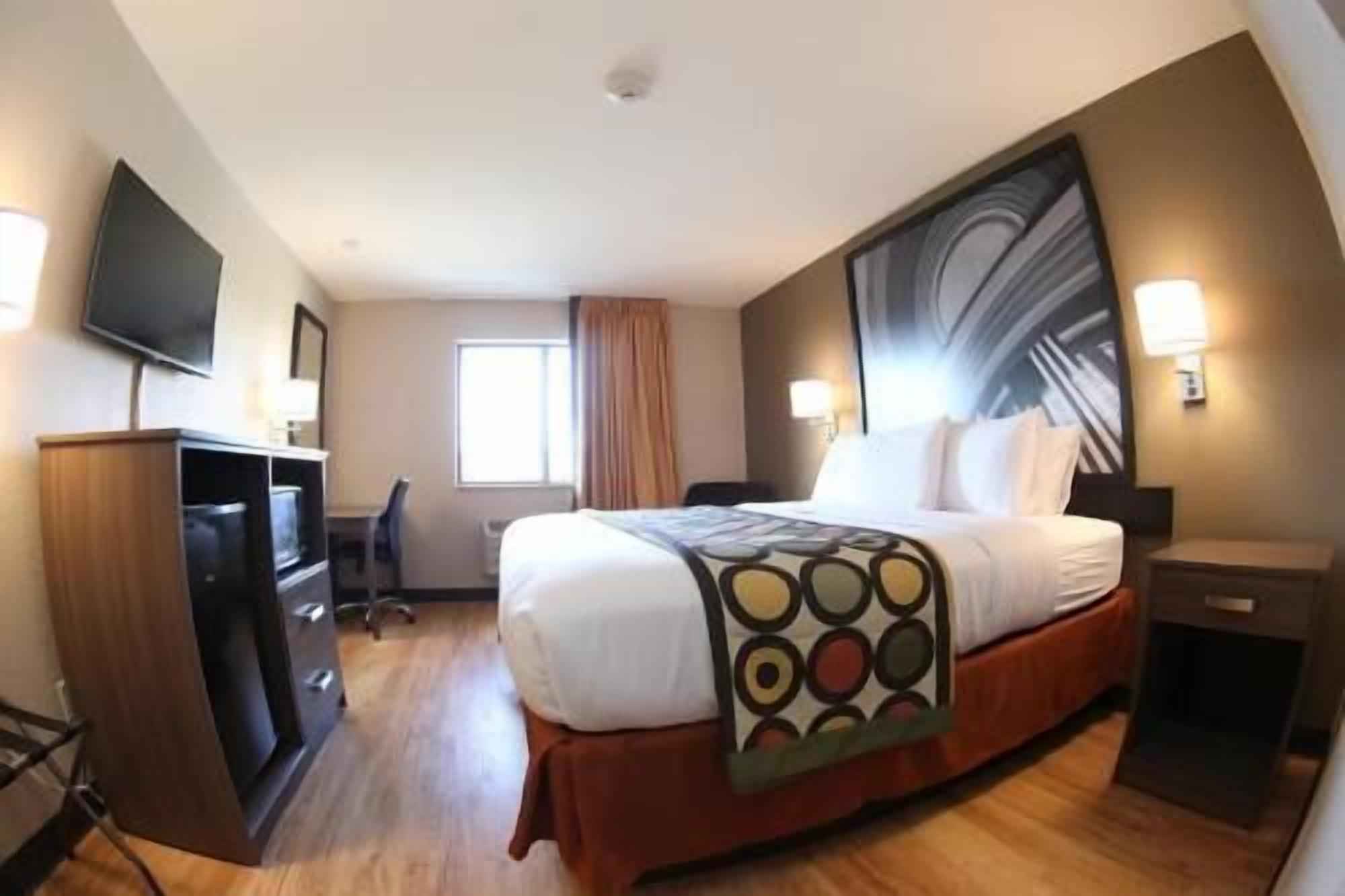 Hypo-allergenic bedding, pillowtop beds, desk, blackout drapes