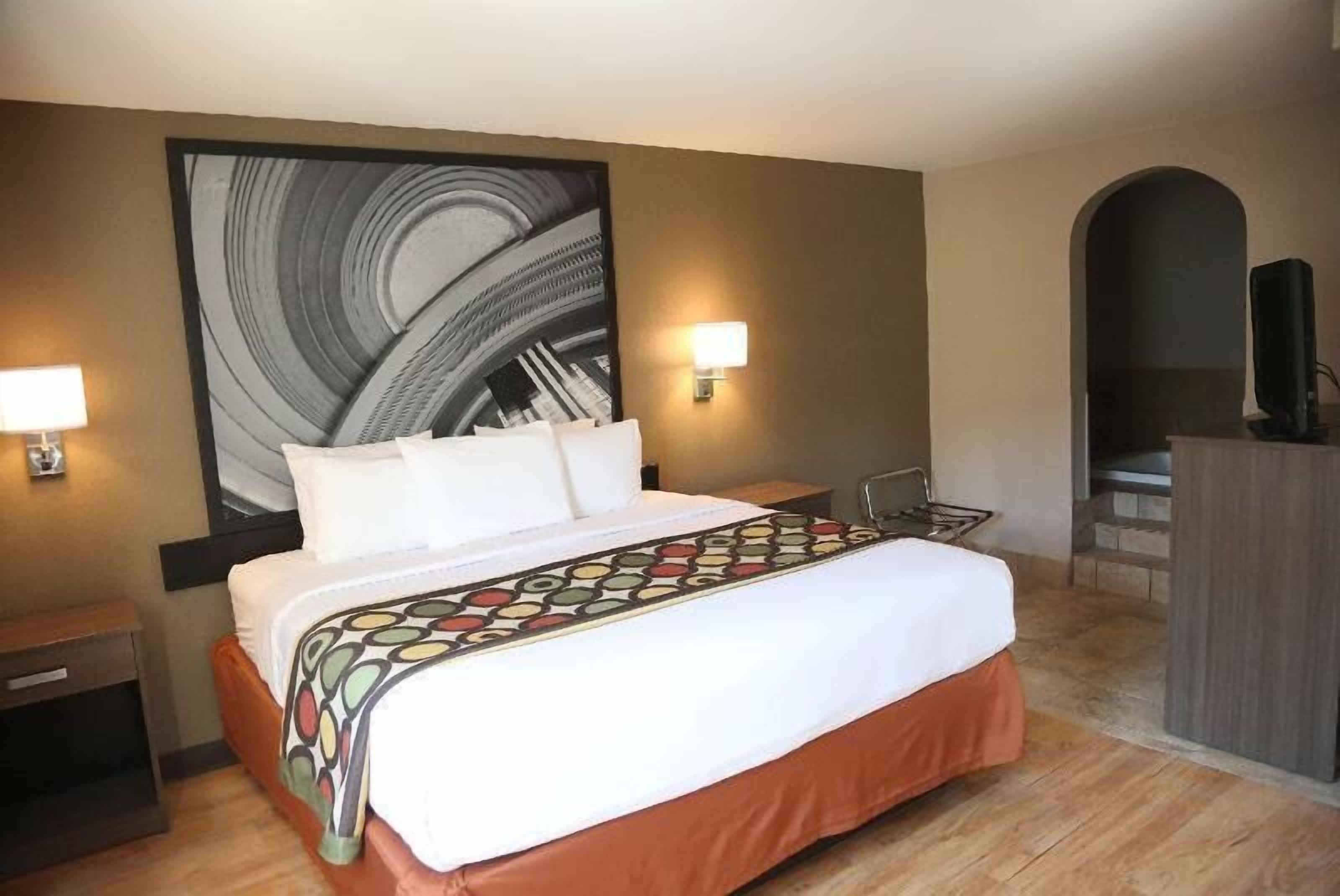 Hypo-allergenic bedding, pillowtop beds, desk, blackout drapes