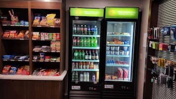 A vending area with snack and drink options, including chips, sodas, and bottled water.