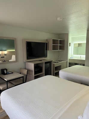 Desk, laptop workspace, free WiFi, bed sheets