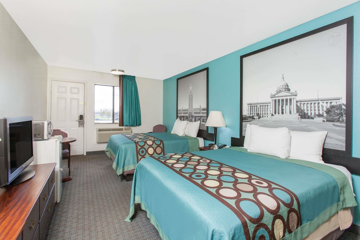Pillow-top beds, desk, laptop workspace, blackout curtains