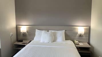 Suite, 1 Queen Bed, Non Smoking | Desk, laptop workspace, blackout curtains, iron/ironing board