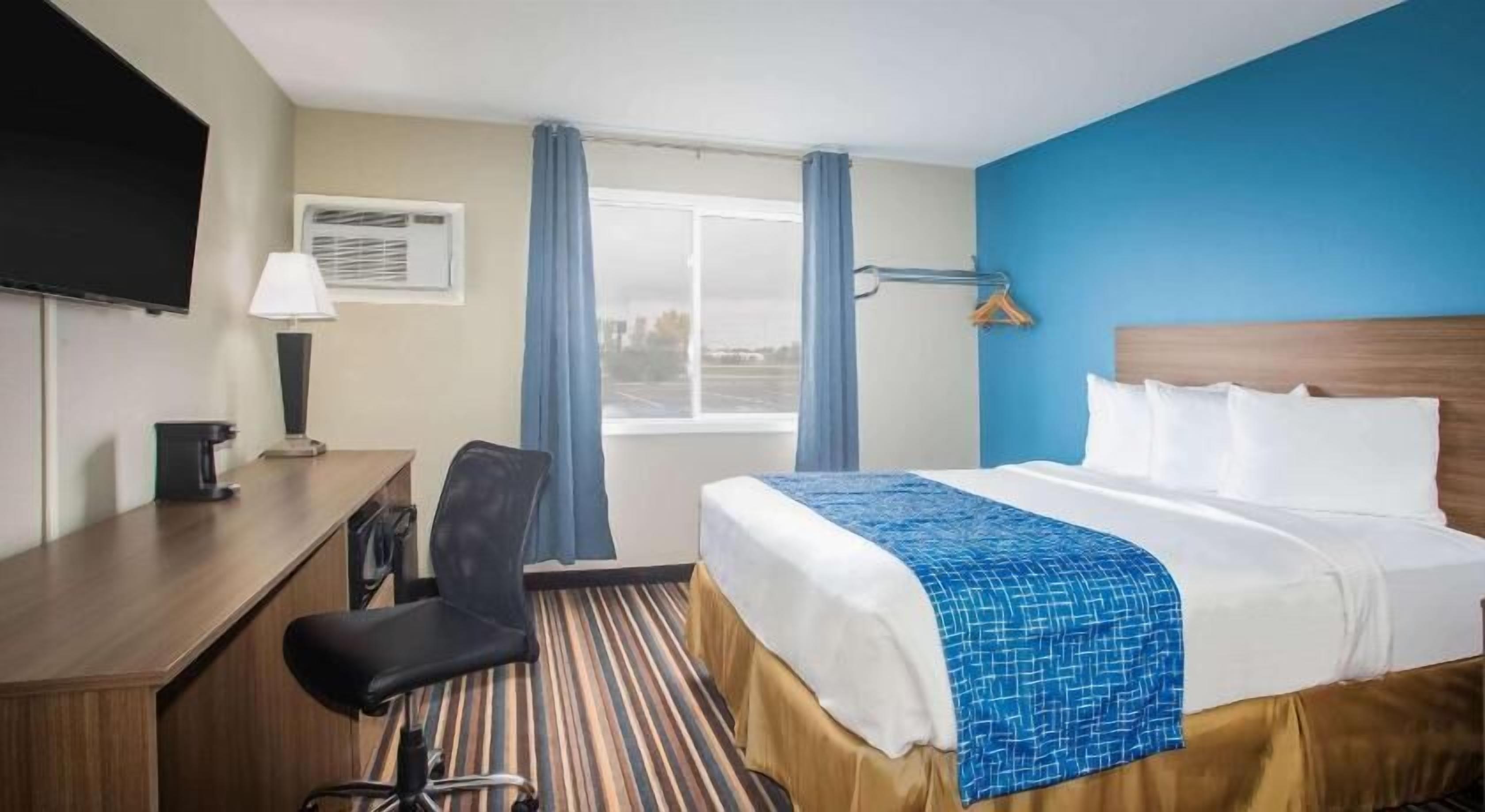 Desk, blackout curtains, iron/ironing board, free cots/infant beds