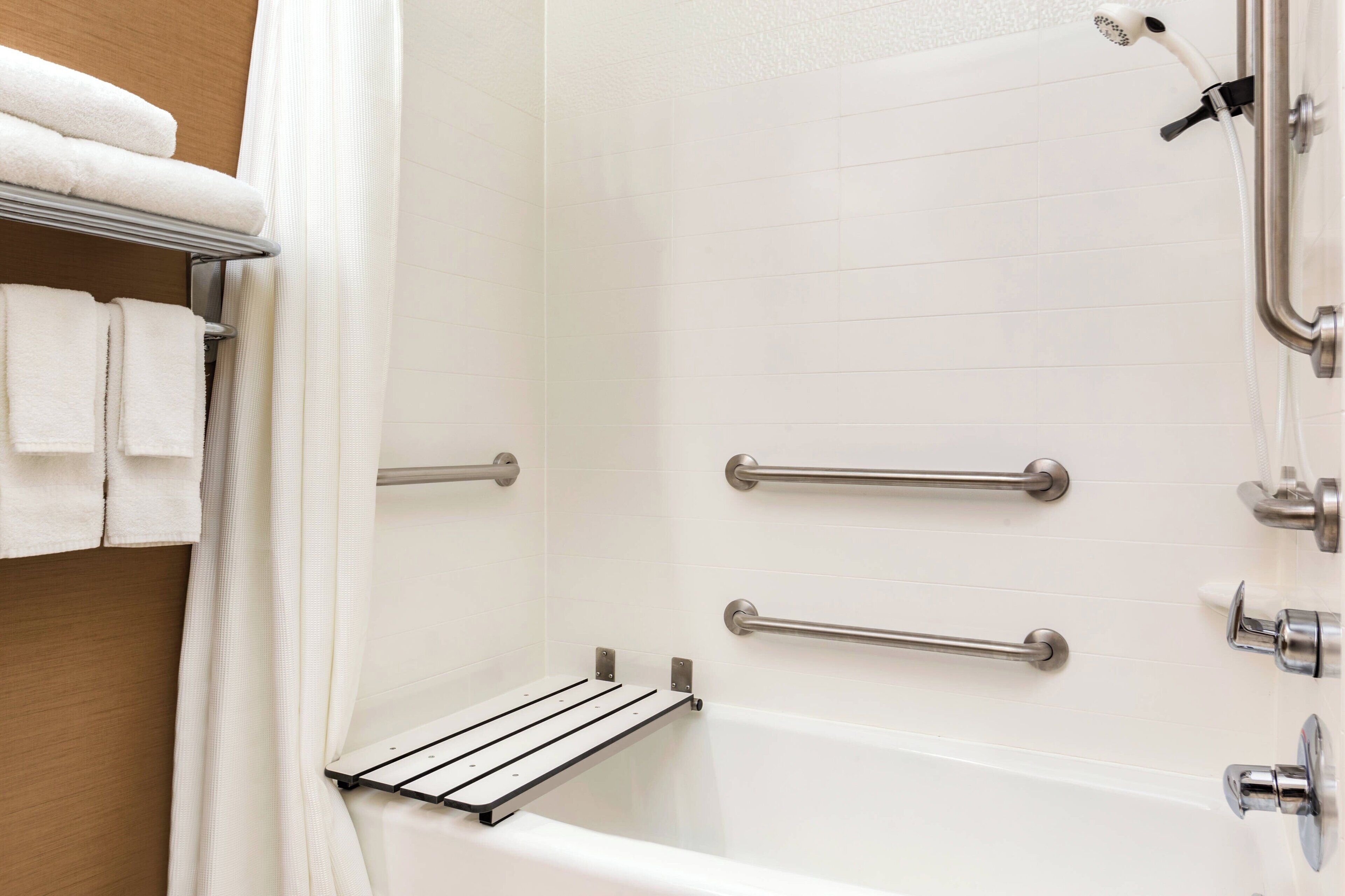 combined shower/bathtub, free toiletries, hair dryer, towels