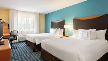 Premium bedding, pillowtop beds, desk, laptop workspace