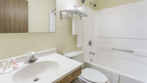 A modern bathroom with a sink, toilet, and bathtub. - Super 8 by Wyndham Danville VA (Danville)