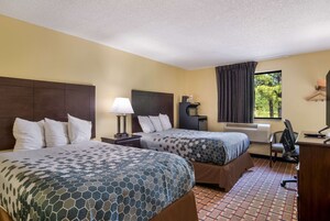 Tabla de planchar con plancha, cunas gratuitas y wifi gratis 