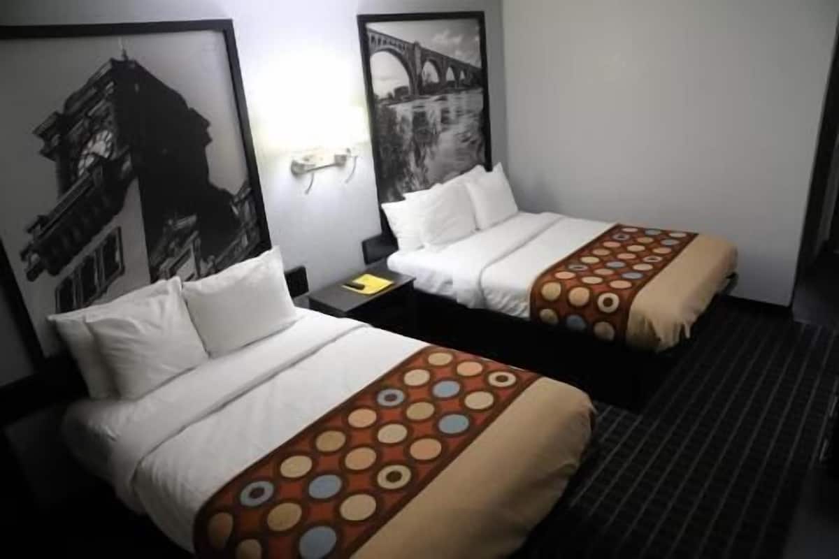 Blackout drapes, iron/ironing board, free WiFi, bed sheets