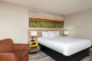 Room, 1 King Bed, Smoking | Desk, iron/ironing board, cribs/infant beds, bed sheets - Days Inn & Suites by Wyndham Kansas City South (Kansas City)