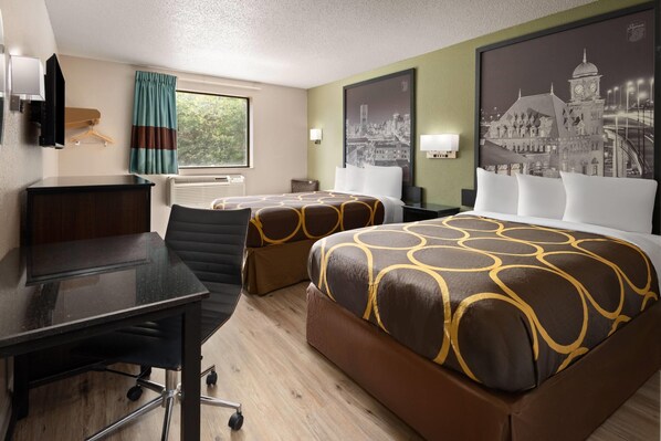 A hotel room with a desk, two beds, a chair, a TV, a window with curtains, and two wall-mounted lamps.