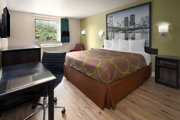 Escritorio, tabla de planchar con plancha, wifi gratis y ropa de cama