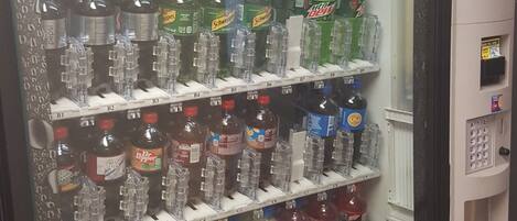 A Gatorade vending machine stocked with various beverages.