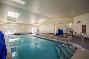 Indoor pool, open 6:00 AM to 11:00 PM, pool loungers