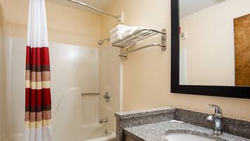 Combined shower/tub, hair dryer, towels, soap