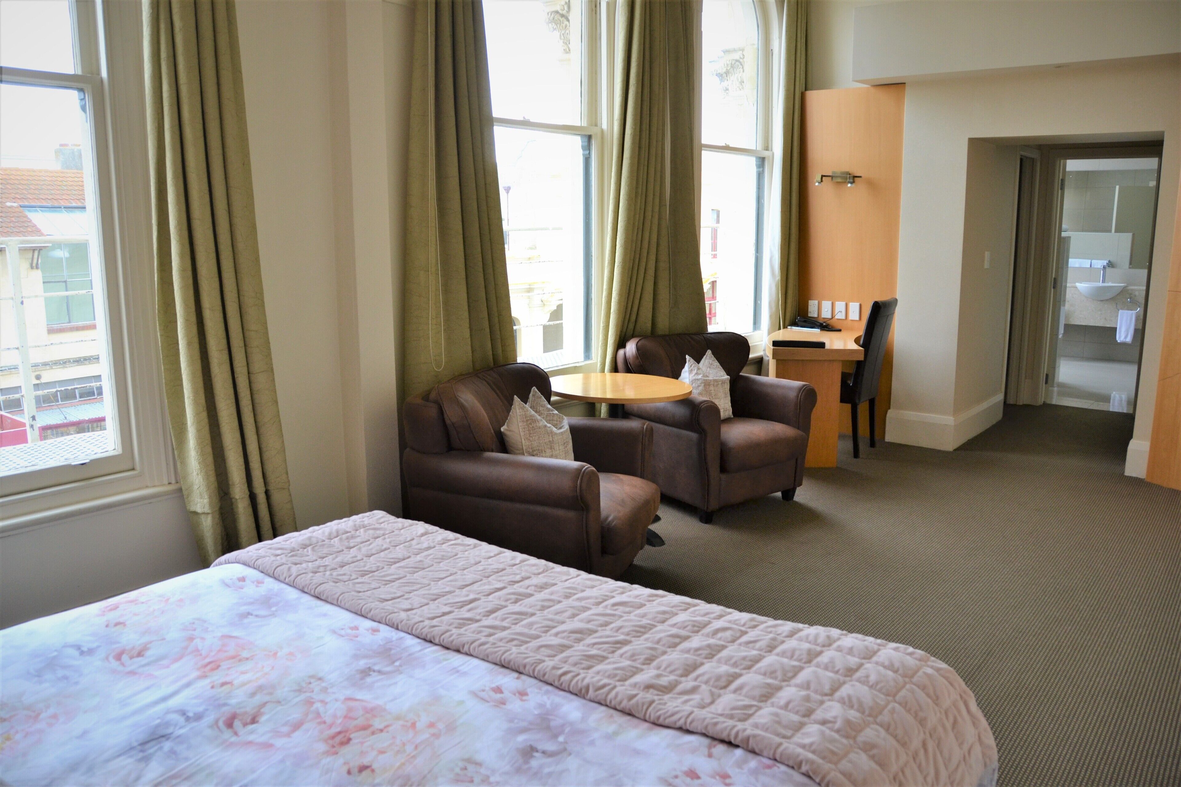 junior suite | bathroom | shower, free toiletries, hair dryer, towels