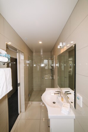 Premium Queen | Bathroom | Shower, free toiletries, hair dryer, bathrobes