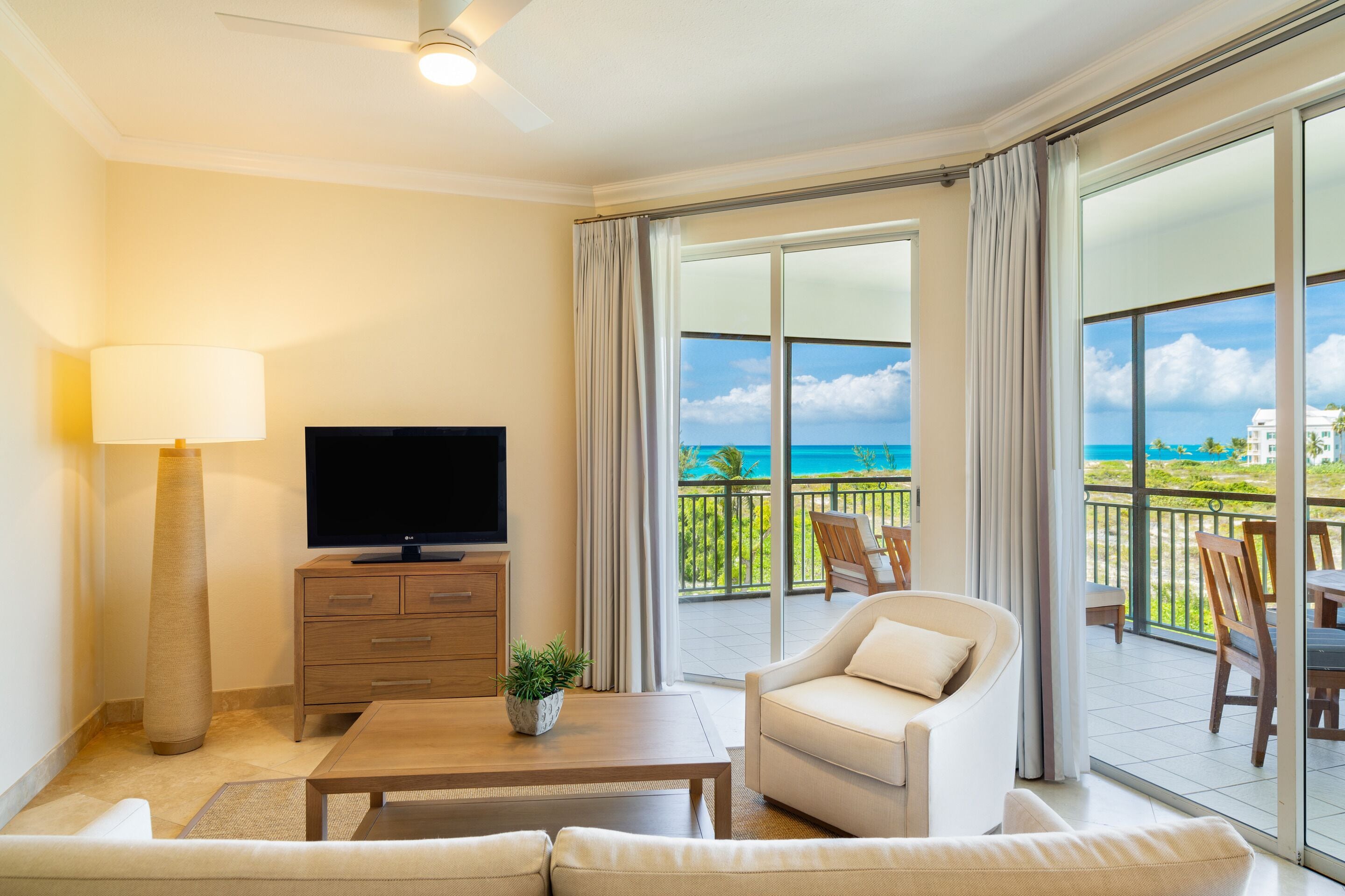 suite, 1 bedroom, ocean view | in-room safe, desk, blackout curtains, iron/ironing board
