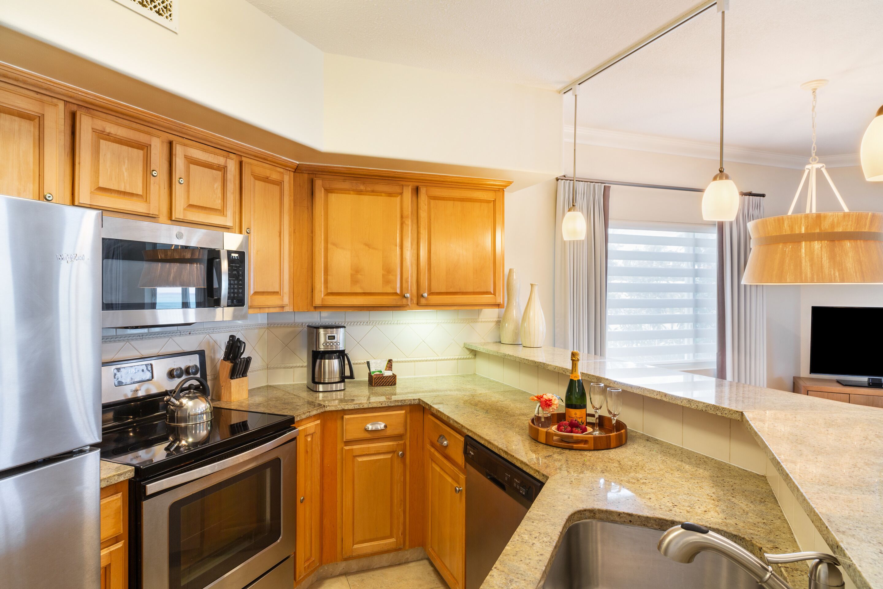 suite, 1 bedroom, ocean view | in-room safe, desk, blackout curtains, iron/ironing board