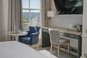 1 bedroom, desk, blackout drapes, iron/ironing board