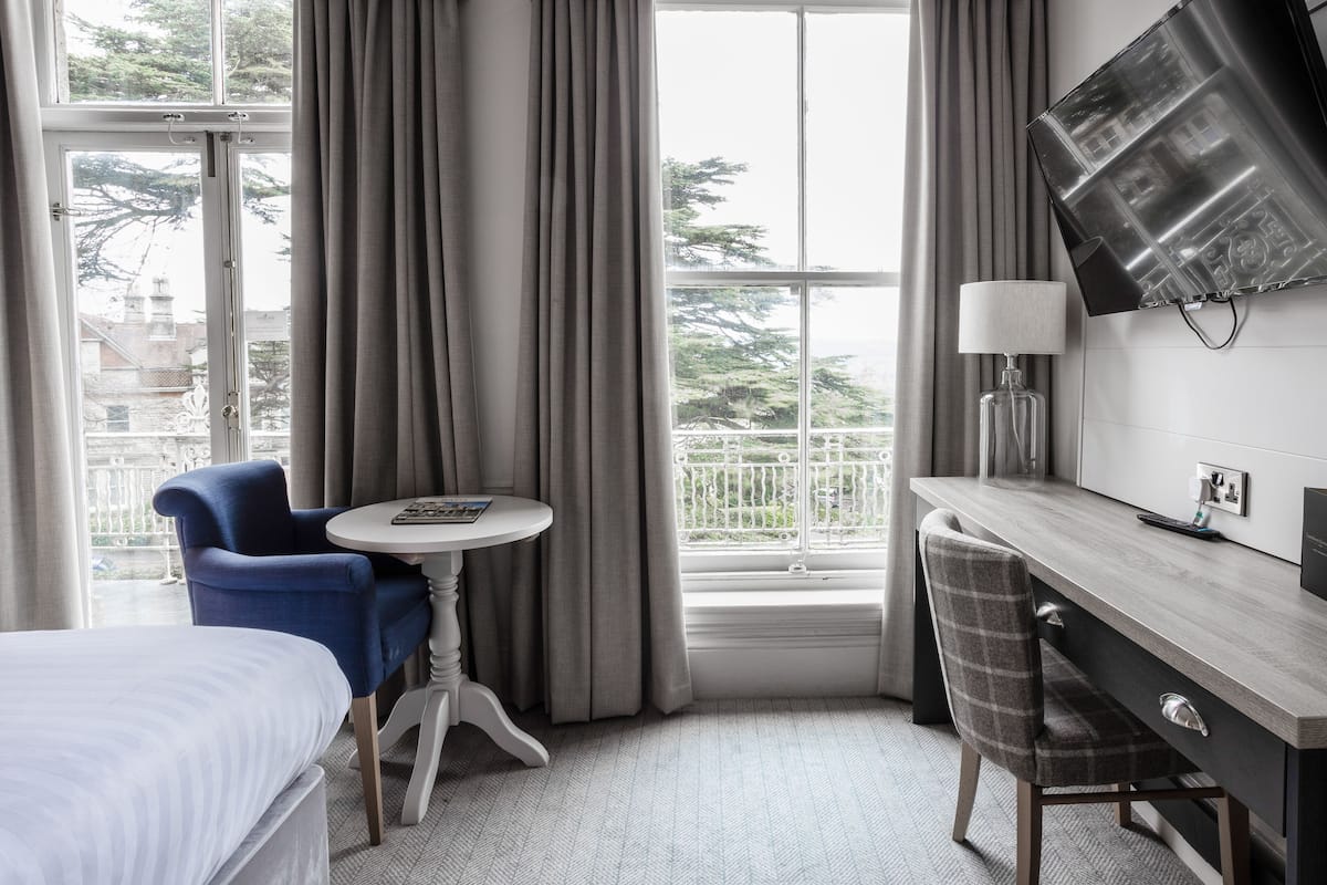 Double Room with City View | Desk, blackout drapes, iron/ironing board, free WiFi