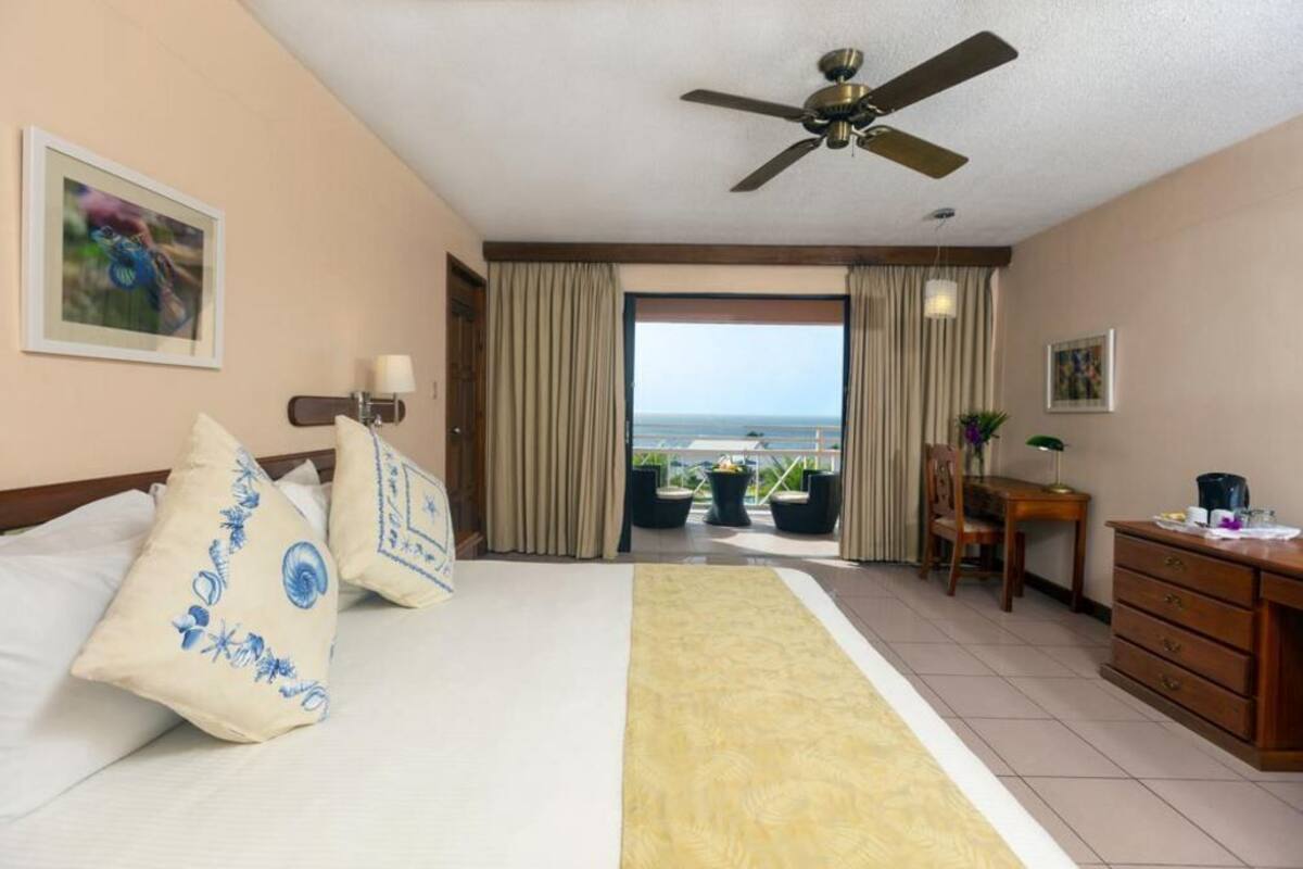 Premium bedding, down comforters, in-room safe, laptop workspace