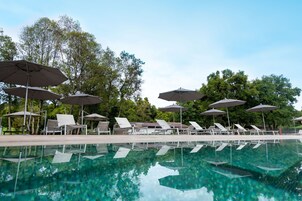 Outdoor pool, open 7:00 AM to 7:00 PM, pool umbrellas, sun loungers