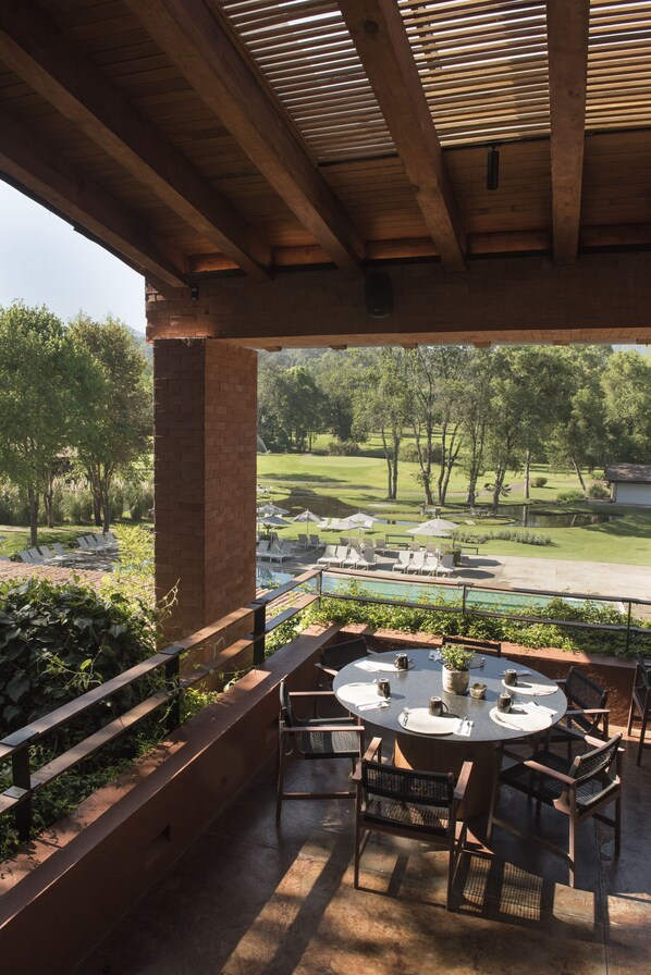 Breakfast, lunch, dinner served; farm to table cuisine, pool views 