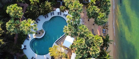 2 outdoor pools, open 7:00 AM to 7:00 PM, pool umbrellas, sun loungers