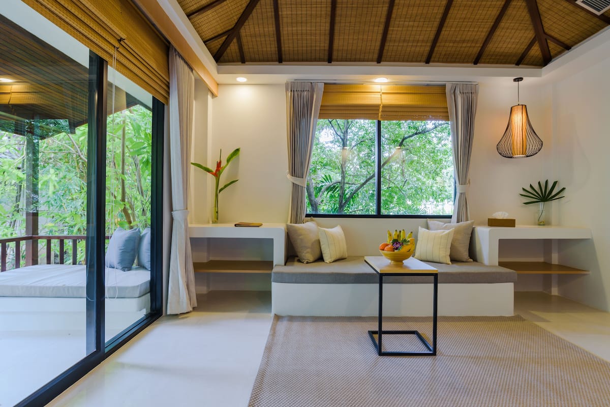 deluxe villa, 1 bedroom, pool view, poolside | living room | 32-inch lcd tv with satellite channels, tv, ping pong