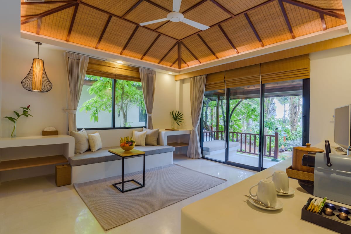 Deluxe Villa, 1 Bedroom, Pool View, Poolside | Living room | 32-inch LCD TV with satellite channels, TV