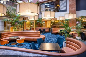 Relax in our inviting lounge area, featuring comfortable seating and ample lighting.