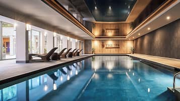 Indoor pool, open 6:30 AM to 9:30 PM, pool loungers