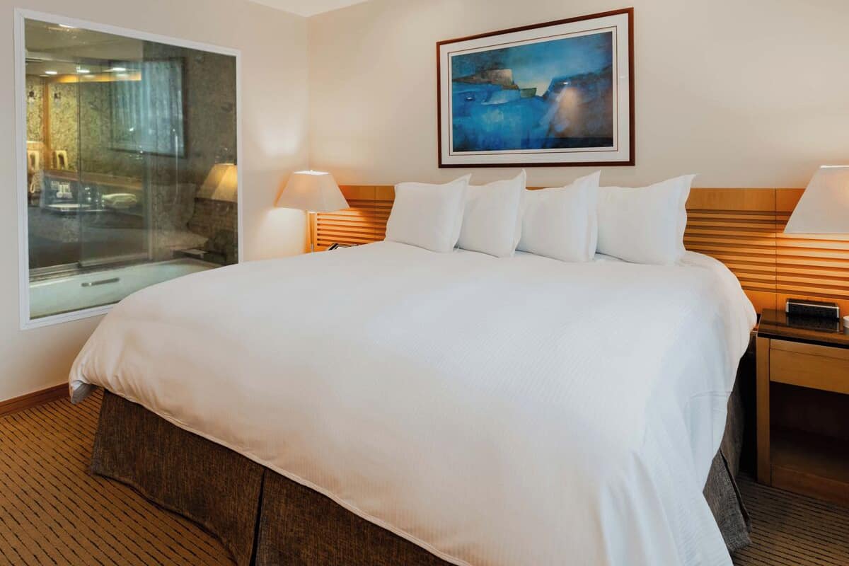 Executive Room | Premium bedding, minibar, in-room safe, individually decorated