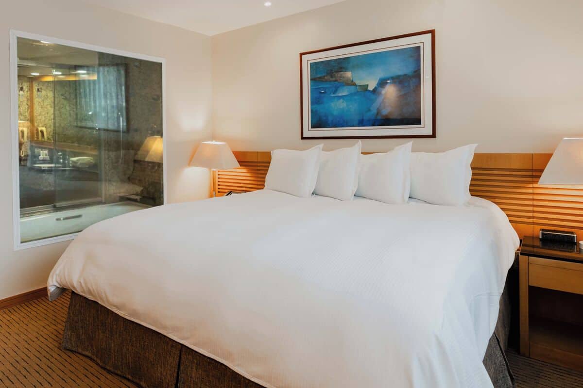 Executive Room | Premium bedding, minibar, in-room safe, individually decorated