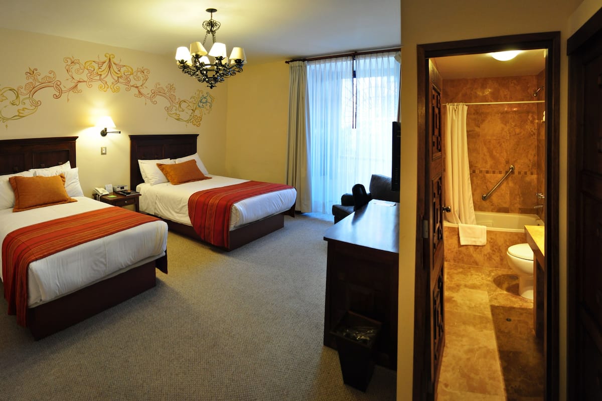 Premium bedding, down duvets, minibar, in-room safe