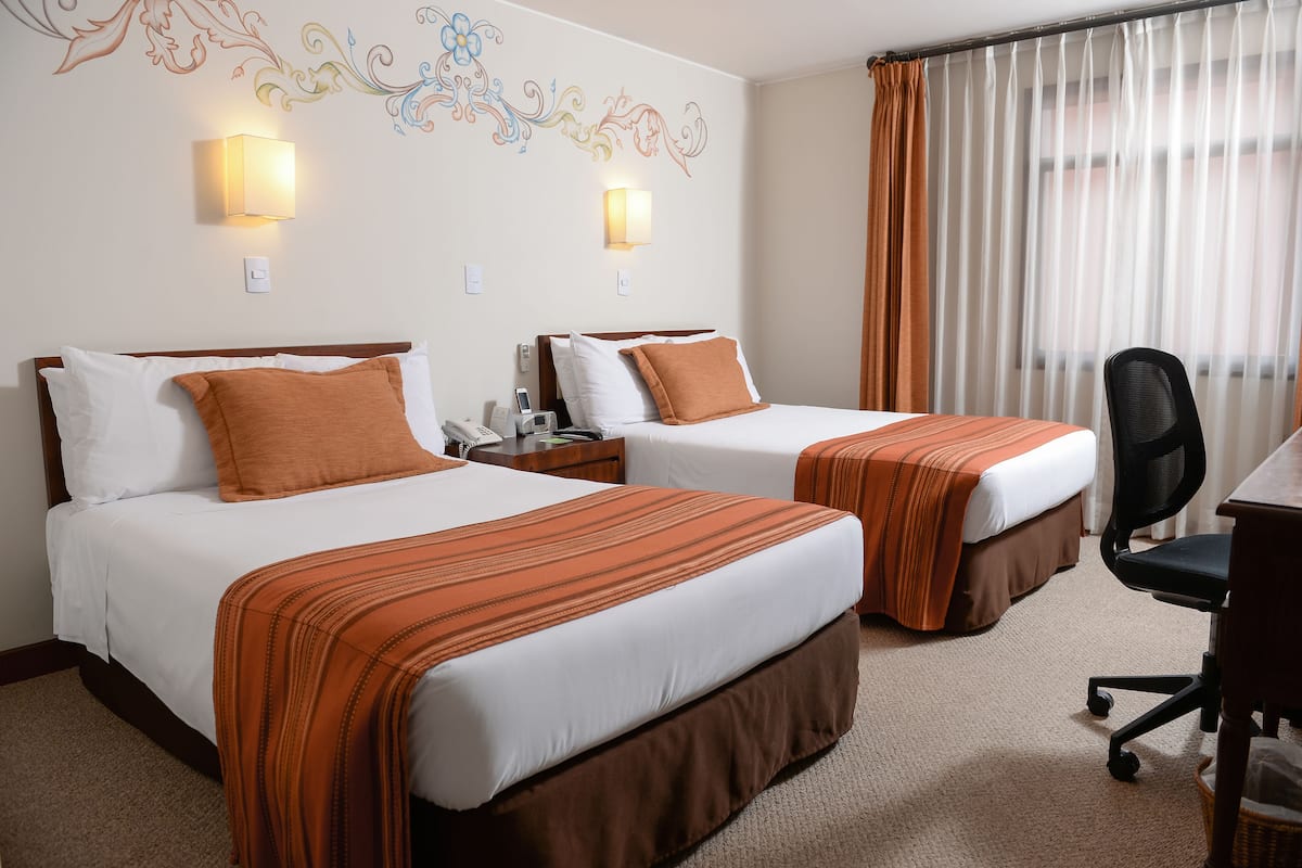 Premium bedding, down duvets, minibar, in-room safe
